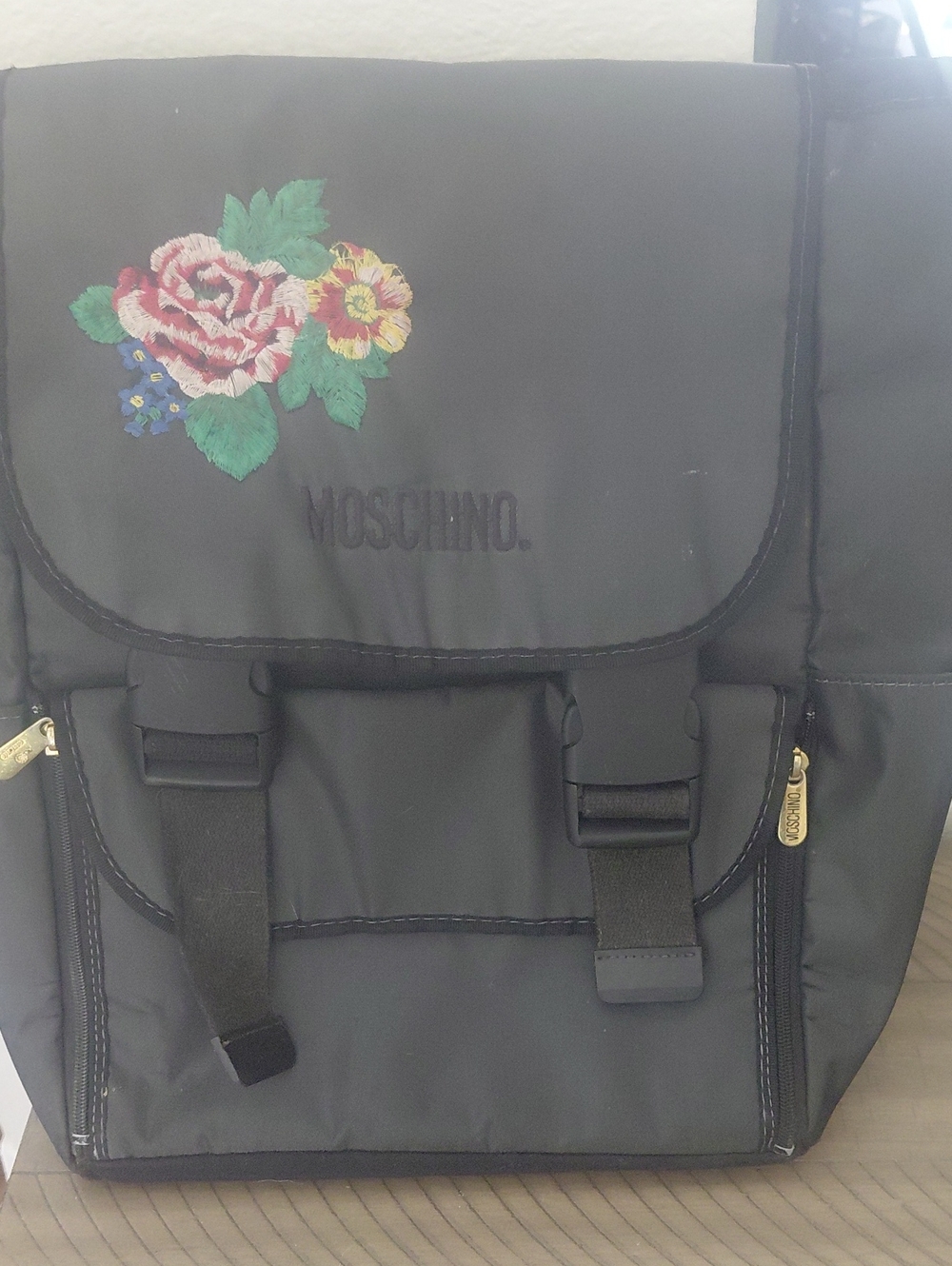 Moschino Black Backpack with Embroidered Floral Accent